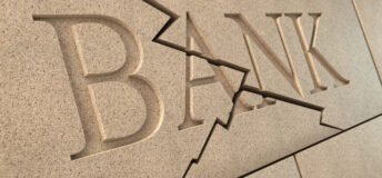 High quality 3d rendering of a sandstone 'BANK' sign breaking up with cracks