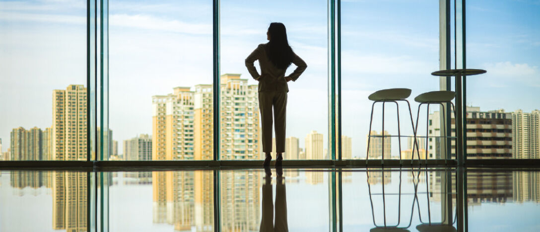 Woman standing in a window