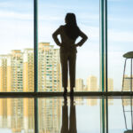 Woman standing in a window