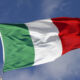 The Italian flag waving in the wind.