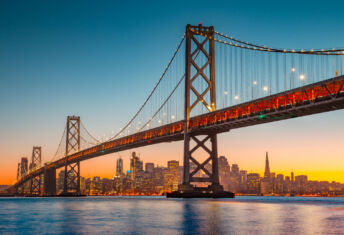 Bay Area sees rise in deeds-in-lieu sale as lenders move on distressed assets Classic panoramic view of San Francisco skyline with famous Oakland Bay Bridge illuminated in beautiful golden evening light at sunset in summer, San Francisco Bay Area, California, USA