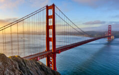 The Golden Gate Bridge and Bay area in San Francisco, California at sunrise