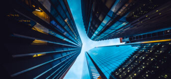 Looking directly up at the skyline of the financial district in central London