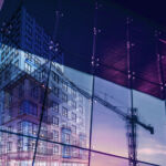 Construction crane and a new high rise building reflected into a newly built office building. New offices are being built to satisfy the growing demand