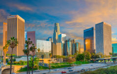 Dusk light with dramatic clouds in downtown Los Angeles and freeway,California
