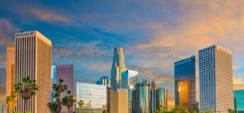Dusk light with dramatic clouds in downtown Los Angeles and freeway,California