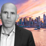Scott Rechler, chairman and CEO at RXR, over a New York City skyline
