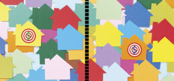 Illustrated photo of colorful houses laid over other houses, representing the real estate and housing sectors.