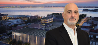 Eric Alini, chief executive officer at Counterpointe Sustainable Real Estate, in front of a rendering of Echelon Studios in Brooklyn, New York.