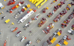 Plastic and metal ware for construction viewed from above at a depot. Industrial outdoor storage.