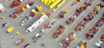 Plastic and metal ware for construction viewed from above at a depot. Industrial outdoor storage.