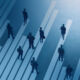 Illustration of professionals standing separately.