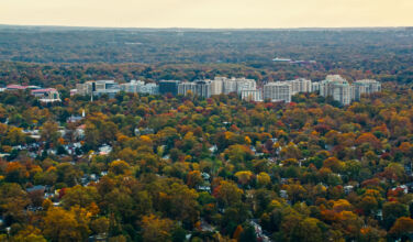 Artemis raises $1bn for healthcare real estate in under six months Helicopter shot of Chevy Chase, Maryland, the northwestern suburbs of Washington, DC, on a hazy afternoon in Fall.