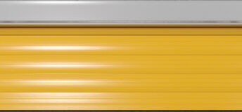 Front View Of Self Storage Units With Roller Doors. Empty Open Unit With Yellow Door.