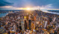 Aerial photo of New York City at sunset.
