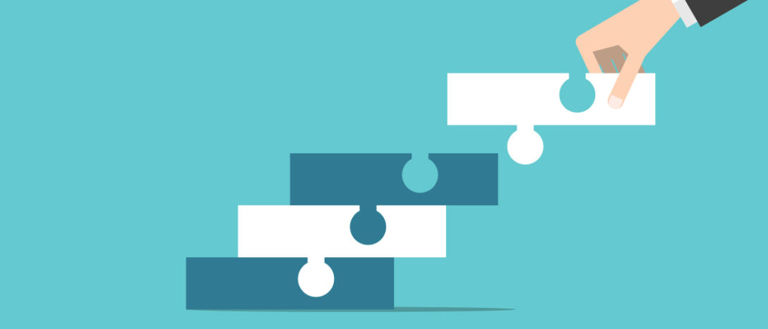 Graphic of a hand placing a puzzle piece into one piece that is connected to another piece, connecting to another.