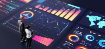 Abstract people standing on a large digital screen, analysing interactive data visualisations and charts for strategic planning. Representing teamwork, technology, and data-driven decision making in a corporate environment.