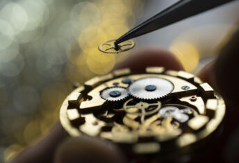 Fairfax times the cycle with a bet on a manager intent on scaling its credit business Pocket watch being repaired by senior watch maker, close-up. Black and white.