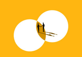 Berkshire strikes deal to acquire MF1 Image of two people shaking hands.