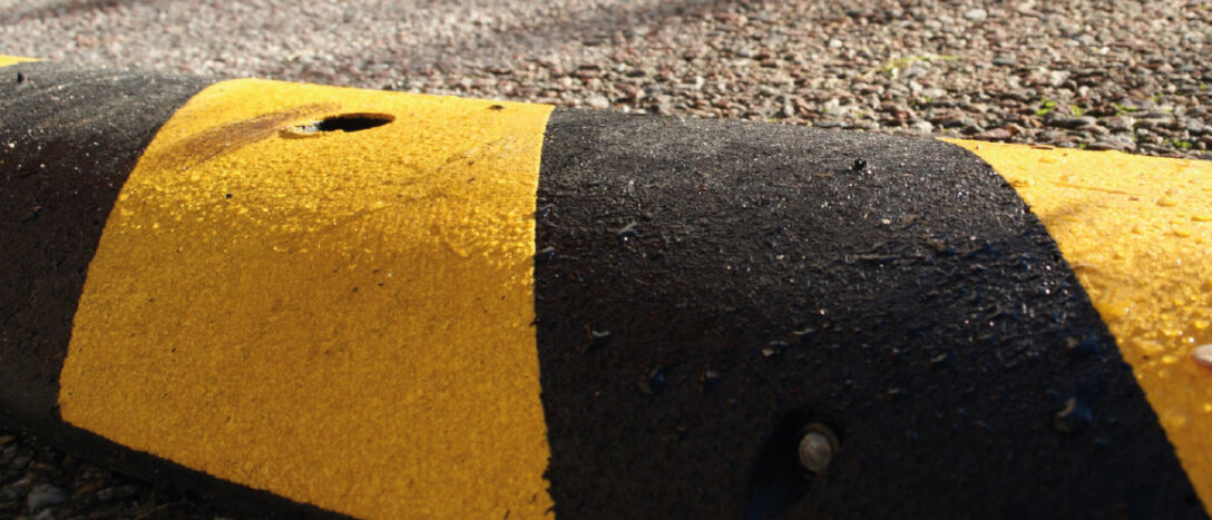 Close up image of a speed bump.