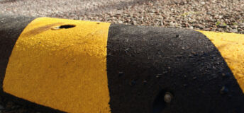 Close up image of a speed bump.