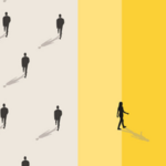 An aerial picture taken of a group of people walking, with one person walking in a different direction to the rest